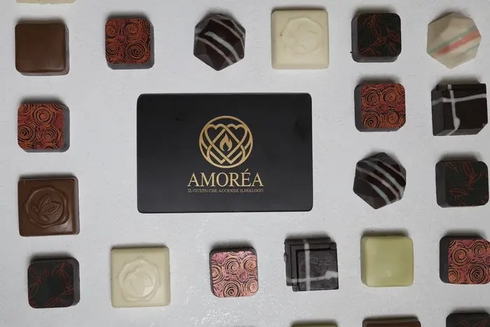 La carta AMOREA tra le praline